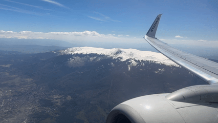 Ryanair passenger captures aerial mountain view from aircraft window