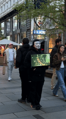 Vienna scenes: masked figure with map, candlelit interior documented
