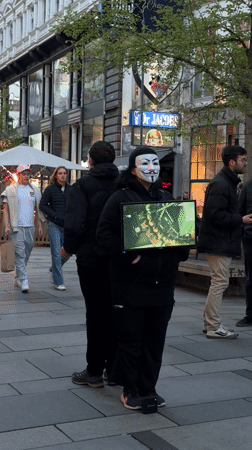 Vienna scenes: masked figure with map, candlelit interior documented