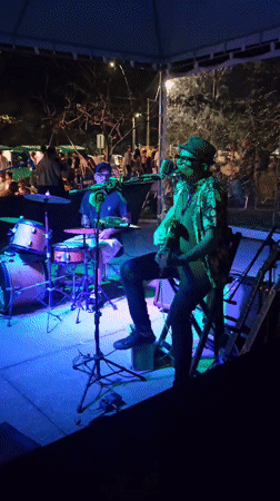 Nighttime musical performance captured in Armação dos Búzios, Brazil