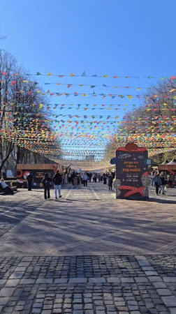 Outdoor market bustles with food vendors in Kaliningrad