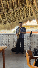 Saxophone performance entertains diners at Kuta Selatan cafe