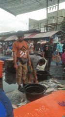 Pre-dawn market activity begins in Lhokseumawe, Indonesia