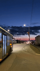 Evening street life documented across Petropavlovsk-Kamchatsky during twilight hours
