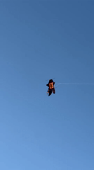 Morning beach recreation with kite flying in Denpasar