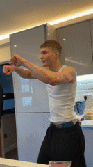 London man cooks and dances in kitchen Thursday evening