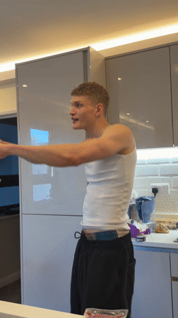 London man cooks and dances in kitchen Thursday evening