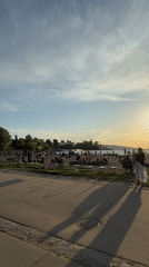 Crowded Vancouver beach draws visitors at sunset