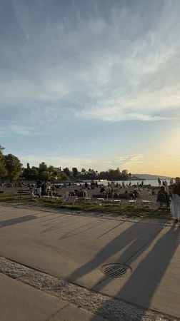 Crowded Vancouver beach draws visitors at sunset