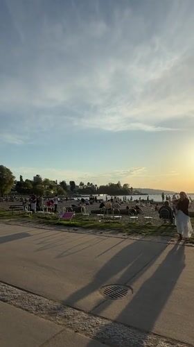 Crowded Vancouver beach draws visitors at sunset
