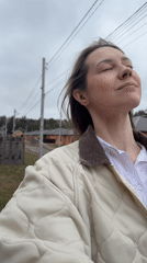 Woman captures morning routine and flower photography in Chaikovsky