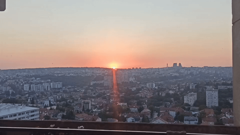 Sunrise captured over Belgrade suburb cityscape Monday morning