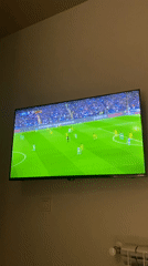 Soccer match viewed on TV in Batumi, Georgia