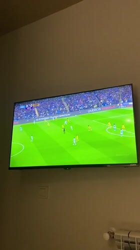 Soccer match viewed on TV in Batumi, Georgia