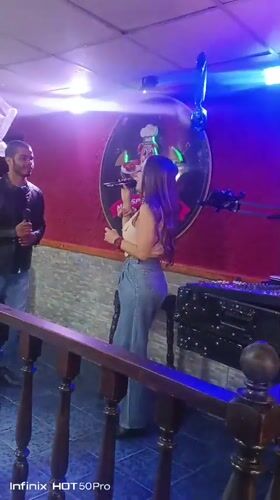Karaoke duo performs at Caracas restaurant celebration