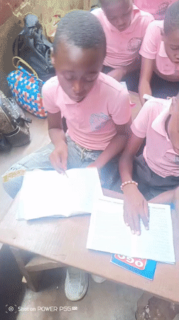 School day begins in Onitsha classroom with students and teacher