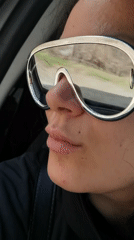 Person in silver sunglasses observed traveling through Niva, Russia