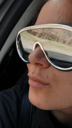 Person in silver sunglasses observed traveling through Niva, Russia