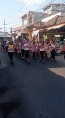 Traditional Kuda Lumping procession moves through Semen, East Java