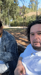 Two men filmed on park bench in Ramat Gan