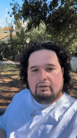 Two men filmed on park bench in Ramat Gan