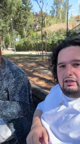 Two men filmed on park bench in Ramat Gan