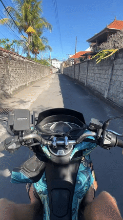 Scooter ride through Sukawati streets, Bali