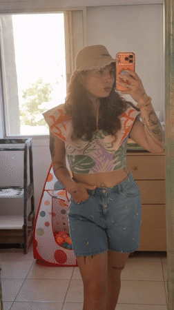 Woman takes morning selfies at Kiryat Bialik residence