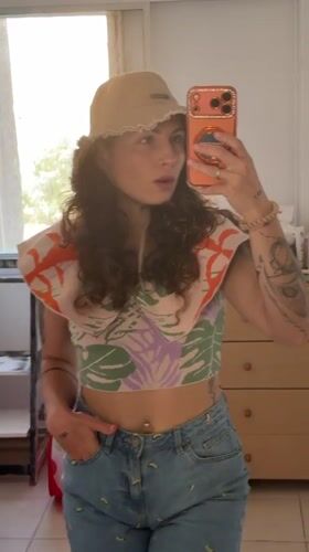 Woman takes morning selfies at Kiryat Bialik residence