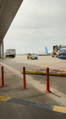 White van drives through airport parking area in Pendik