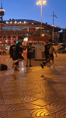 Dancing at dusk near Montjuïc's iconic fountain and museum