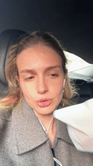 Woman records selfie video inside vehicle in Tbilisi