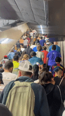 Morning rush hour crowds pack Barcelona subway station