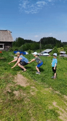 Family enjoys outdoor leisure activities in rural Russian village
