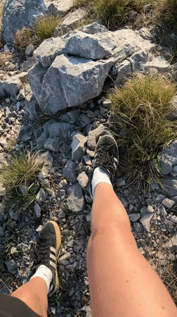Person records feet on rocky terrain in Montenegro