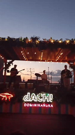 Live rooftop gig at dusk in Wrocław