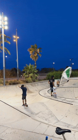 Sunset hangout on Barcelona's Barceloneta breakwater and beach