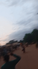 Evening street life across two rural Nigerian communities