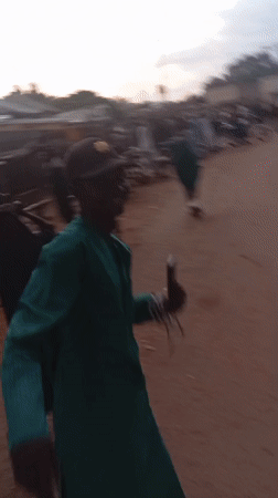 Evening street life across two rural Nigerian communities