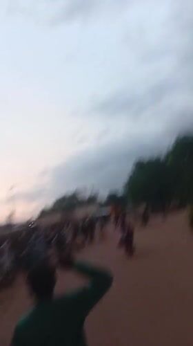 Evening street life across two rural Nigerian communities