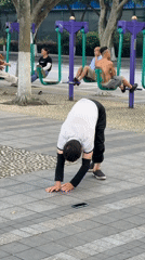Man performs early morning stretching routine in Jiangjin park