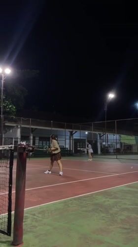 Night tennis under the lights in Manado, Indonesia