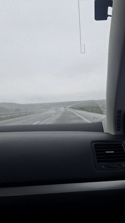 Motorist documents rainy highway conditions near Zheleznik, Bulgaria
