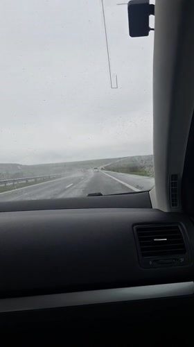Motorist documents rainy highway conditions near Zheleznik, Bulgaria