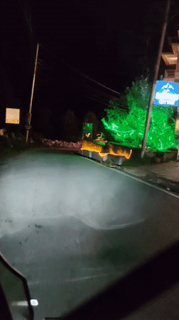 Nighttime scenes along a Himachal valley road and village