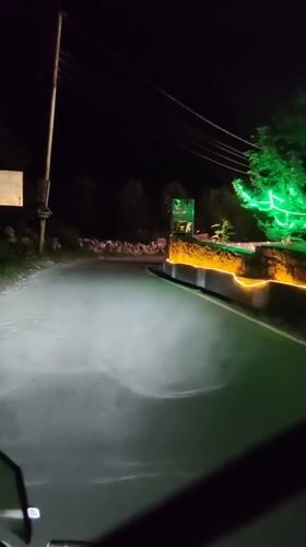 Nighttime scenes along a Himachal valley road and village