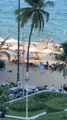 Nha Trang beach in full swing on a sunny July morning