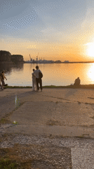 Sunset gathering draws families to waterfront platform