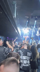 Nightclub scene captured in Varna with dancing crowds, colorful lights