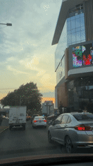 Traffic stops during sunset in Puebla, Mexico